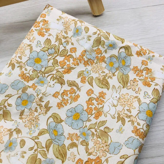 5257 藍橘花朵兔純棉印花布料/幅寬110cm